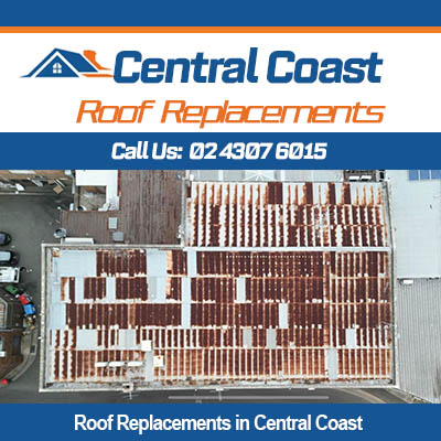 Roof replacement on Central Coast showing old tile roof removal and replacement in progress